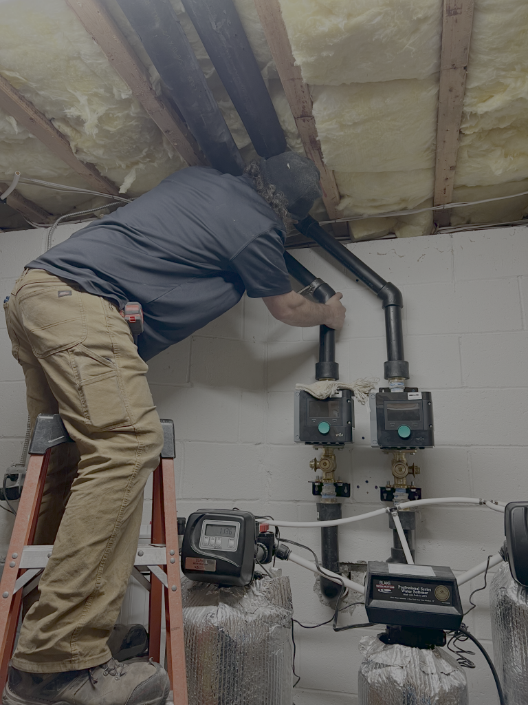 Technician working on HVAC system installation in Montague Township, NJ.